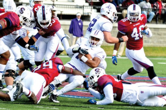 Photo courtesy of SCSU Athletics Multiple South Carolina State defenders take down the Furman Paladins ball carrier en route to a Paladins comeback and first round victory