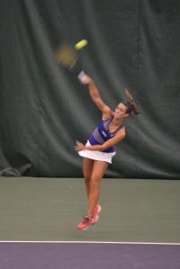 Junior Blair Martin smashes a serve during this weeknd’s Furman Fall Classic. Photo courtesy of Jake Crouse