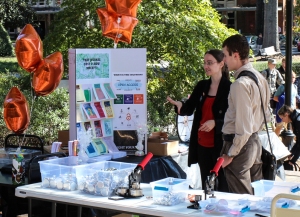 Christy Allen talks with a student about the importance of Open Access Week, an initiative to promote free and accessible research online, outside of the Duke Library. Photo courtesy of Furman Libraries